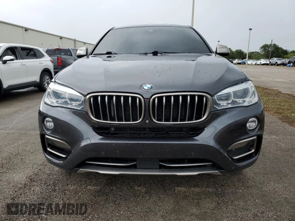 2018 BMW X6 xDrive50i with VIN 5UXKU6C5XJ0W39056, listed as a Copart auction lot 75116634 with 90,043 mi miles and Salvage Title. Bid and sale history available at carsss.com. Image 5.