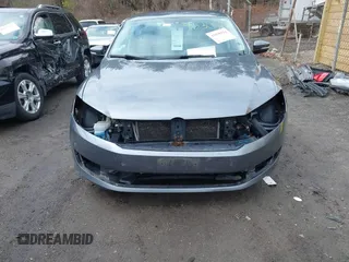 2015 Volkswagen Passat Wolfsburg Edition with VIN 1VWAT7A37FC026077, listed as a IAAI auction lot 41630524 with 136,966 mi miles and . Bid and sale history available at DreamBid. Image 6.