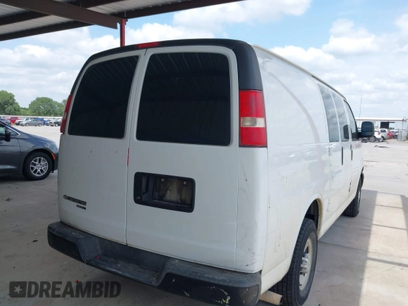 2013 Chevrolet Express Cargo Van with VIN 1GCWGFBAXD1168680, listed as a IAAI auction lot 42113126 with 162,376 mi miles. Bid and sale history available at carsss.com. Image 4.