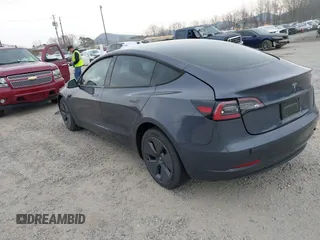 2023 Tesla Model 3 with VIN 5YJ3E1EA5PF474382, listed as a IAAI auction lot 41764268 with 31,040 mi miles and . Bid and sale history available at DreamBid. Image 3.