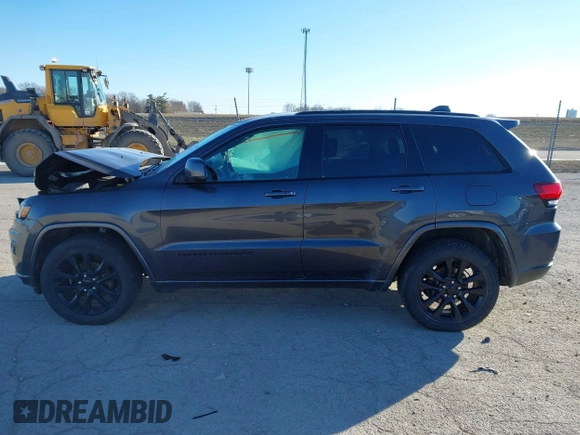 2017 Jeep Grand Cherokee Laredo with VIN 1C4RJFAG7HC769642, listed as a IAAI auction lot 41367874 with 128,095 mi miles. Bid and sale history available at carsss.com. Image 14.