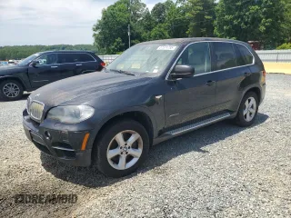 2011 BMW X5 50i with VIN 5UXZV8C54BL418043, listed as a Copart auction lot 57574785 with 192,613 mi miles and Clean title. Bid and sale history available at DreamBid. Image 1.