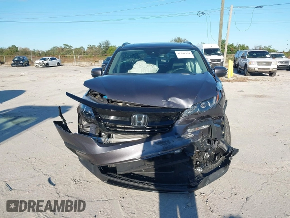 2022 Honda Pilot Special Edition with VIN 5FNYF5H25NB035016, listed as a IAAI auction lot 41248194 with 30,039 mi miles and . Bid and sale history available at DreamBid. Image 12.