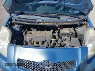 2007 Toyota Yaris with VIN JTDJT923475072209, listed as a IAAI auction lot 42139042 with 335,137 mi miles. Bid and sale history available at carsss.com. Image 10.