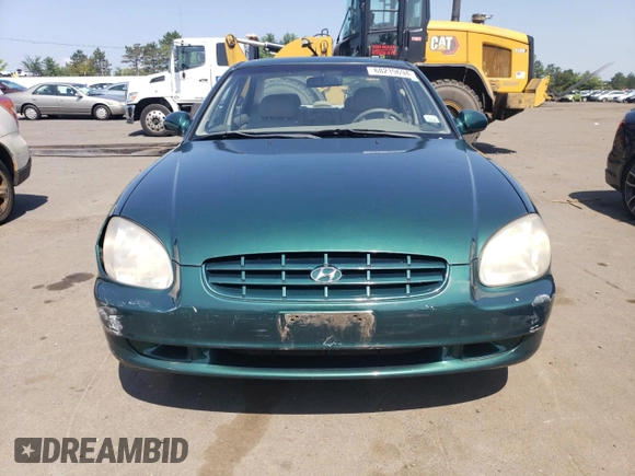 1999 Hyundai Sonata GLS with VIN KMHWF35V9XA100869, listed as a Copart auction lot 68219694 with 144,388 mi miles and Non Repairable. Bid and sale history available at carsss.com. Image 5.