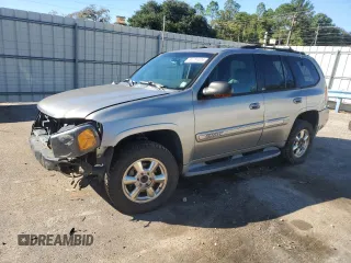 2002 GMC Envoy SLT with VIN 1GKDS13SX22301062, listed as a Copart auction lot 81791024 with 0 mi miles and Salvage Title. Bid and sale history available at carsss.com. Image 1.