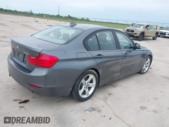 2014 BMW 3 Series 328i with VIN WBA3C1C55EK109175, listed as a IAAI auction lot 42463051 with 153,244 mi miles and . Bid and sale history available at DreamBid. Image 4.
