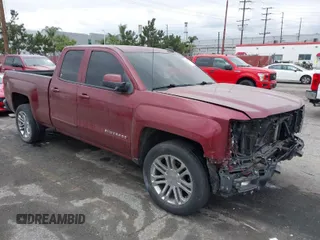 2015 Chevrolet Silverado 1500 LT with VIN 1GCRCRECXFZ238190, listed as a IAAI auction lot 42056318 with 102,040 mi miles. Bid and sale history available at carsss.com. Image 1.