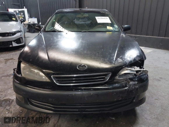 2001 Lexus ES 300 z VIN JT8BF28G415112517, wystawiony jako IAAI lot #42208849 z przebiegiem 202 029 mil mil oraz . Historia ofert i sprzedaży dostępna na DreamBid. Obrazek 12.