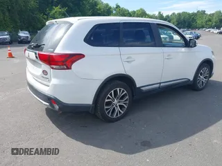 2016 Mitsubishi Outlander SE with VIN JA4AZ3A30GZ048604, listed as a IAAI auction lot 42682525 with Not provided miles and . Bid and sale history available at DreamBid. Image 4.