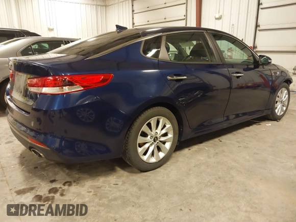 2016 Kia Optima LX with VIN 5XXGT4L34GG002569, listed as a IAAI auction lot 41732810 with 148,044 mi miles. Bid and sale history available at carsss.com. Image 4.