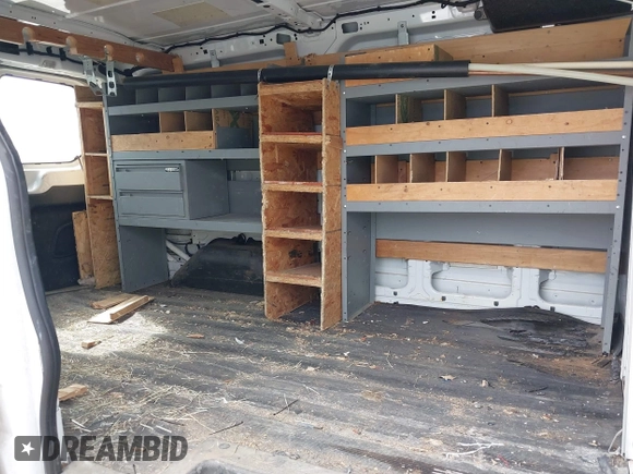 2015 Ford Transit Cargo with VIN 1FTNR1ZM6FKA34609, listed as a IAAI auction lot 42635875 with 214,750 mi miles and . Bid and sale history available at DreamBid. Image 8.