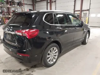 2020 Buick Envision Essence with VIN LRBFXCSA9LD034558, listed as a IAAI auction lot 41700843 with 52,555 mi miles. Bid and sale history available at carsss.com. Image 4.