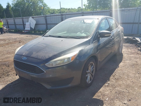 2017 Ford Focus SE with VIN 1FADP3F22HL341553, listed as a IAAI auction lot 42305588 with 165,016 mi miles and . Bid and sale history available at DreamBid. Image 2.