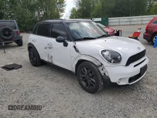 2013 MINI Countryman S with VIN WMWZC3C57DWP23397, listed as a Copart auction lot 61419665 with 139,838 mi miles and Salvage title. Bid and sale history available at DreamBid. Image 4.