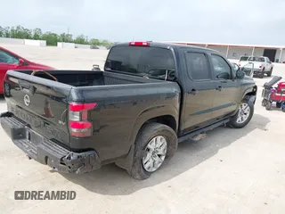 2022 Nissan Frontier SV with VIN 1N6ED1EJ2NN677012, listed as a IAAI auction lot 41967201 with 76,835 mi miles and . Bid and sale history available at DreamBid. Image 4.