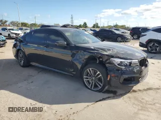 2017 BMW 7 Series 740i with VIN WBA7E2C51HG739462, listed as a Copart auction lot 84157364 with 137,881 mi miles and Salvage Title. Bid and sale history available at carsss.com. Image 4.