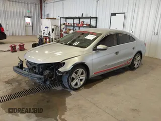 2015 Volkswagen CC Sport with VIN WVWBN7AN1FE816059, listed as a IAAI auction lot 41857589 with 172,854 mi miles and . Bid and sale history available at DreamBid. Image 2.