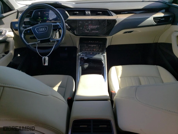 2021 Audi e-tron Premium with VIN WA1AAAGEXMB012122, listed as a Copart auction lot 75797084 with 27,971 mi miles and Salvage Title. Bid and sale history available at carsss.com. Image 8.