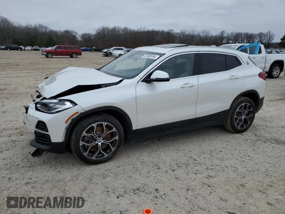 2023 BMW X2 sDrive28i with VIN WBXYH9C07P5V63719, listed as a Copart auction lot 87309194 with 43,124 mi miles and Salvage Title. Bid and sale history available at carsss.com. Image 1.