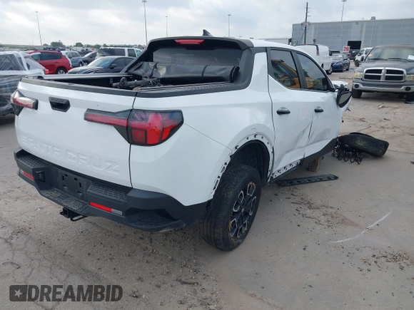 2022 Hyundai Santa Cruz SEL z VIN 5NTJBDAE5NH007005, wystawiony jako IAAI lot #42058065 z przebiegiem 30 825 mil mil oraz . Historia ofert i sprzedaży dostępna na DreamBid. Obrazek 4.