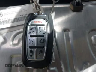 2023 Chrysler Pacifica Hybrid Touring L with VIN 2C4RC1L70PR622000, listed as a IAAI auction lot 42711826 with 65,109 mi miles and . Bid and sale history available at DreamBid. Image 11.