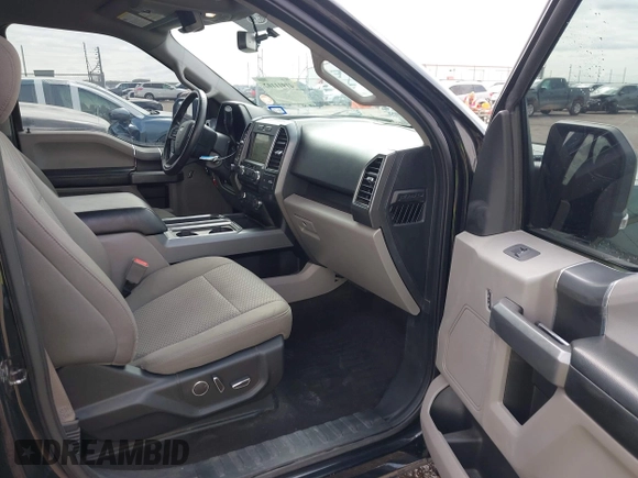 2018 Ford F-150 XL with VIN 1FTEW1E51JFD38844, listed as a IAAI auction lot 41911102 with 116,887 mi miles. Bid and sale history available at carsss.com. Image 5.