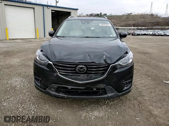 2016 Mazda CX-5 Grand Touring with VIN JM3KE4DY2G0738899, listed as a Copart auction lot 50943255 with 80,807 mi miles and Salvage Title. Bid and sale history available at carsss.com. Image 11.