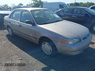 2000 Toyota Corolla VE with VIN 2T1BR12E3YC334103, listed as a IAAI auction lot 42546209 with 220,018 mi miles and . Bid and sale history available at DreamBid. Image 1.