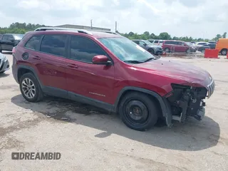 2020 Jeep Cherokee Latitude with VIN 1C4PJLCBXLD506409, listed as a IAAI auction lot 42110399 with 64,332 mi miles and . Bid and sale history available at DreamBid. Image 1.