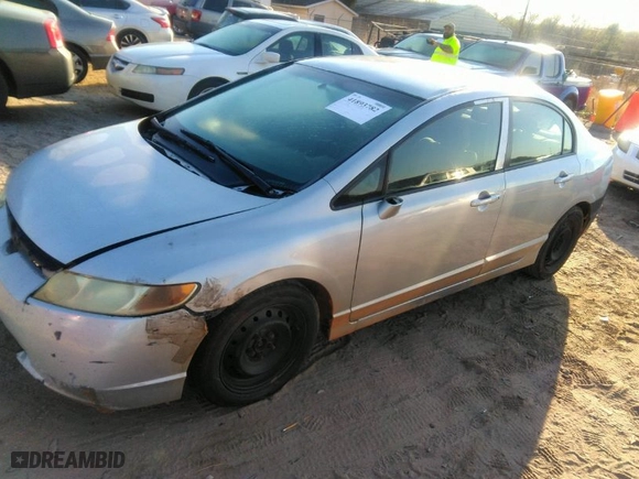 2010 Honda Civic Sdn LX with VIN 2HGFA1F57AH308880, listed as a IAAI auction lot 41893782 with 255,762 mi miles. Bid and sale history available at carsss.com. Image 2.