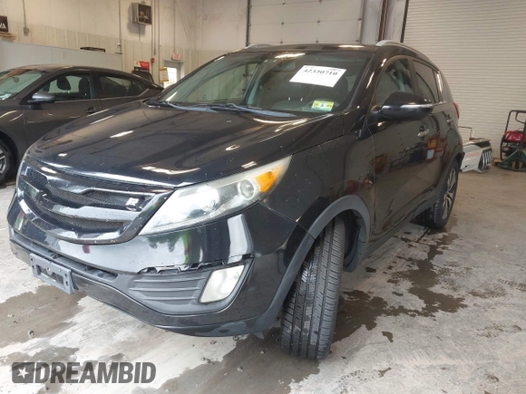 2012 Kia Sportage EX with VIN KNDPCCA2XC7311504, listed as a IAAI auction lot 42330710 with 170,638 mi miles and . Bid and sale history available at DreamBid. Image 2.