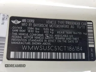 2012 MINI Hardtop with VIN WMWSU3C51CT186184, listed as a Copart auction lot 55090935 with 100,669 mi miles and Salvage Title. Bid and sale history available at DreamBid. Image 13.