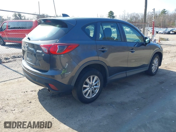 2015 Mazda CX-5 Sport with VIN JM3KE4BY1F0526755, listed as a IAAI auction lot 41768916 with 197,675 mi miles. Bid and sale history available at carsss.com. Image 4.