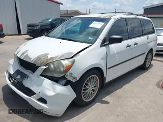 2007 Honda Odyssey LX with VIN 5FNRL382X7B135892, listed as a IAAI auction lot 42223231 with 204,054 mi miles and . Bid and sale history available at DreamBid. Image 20.