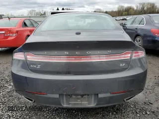2015 Lincoln MKZ with VIN 3LN6L2GK4FR621797, listed as a Copart auction lot 48238215 with 100,738 mi miles and Salvage Title. Bid and sale history available at DreamBid. Image 6.