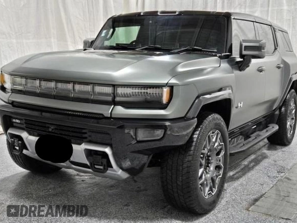 2024 GMC Hummer EV 3X z VIN 1GKB0RDC5RU100378, wystawiony jako Copart lot #88601235 z przebiegiem 7986 mil mil oraz Tytuł czysty. Historia ofert i sprzedaży dostępna na DreamBid. Obrazek 2.