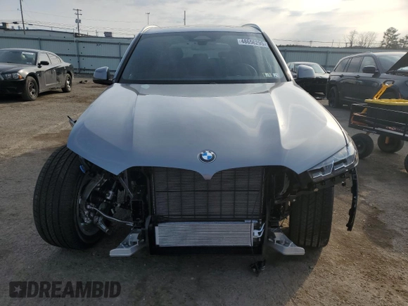 2025 BMW X5 xDrive40i with VIN 5UX23EU01S9Z44555, listed as a Copart auction lot 48656295 with 90 mi miles and Salvage Title. Bid and sale history available at carsss.com. Image 5.