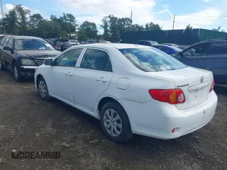 2009 Toyota Corolla with VIN JTDBL40E199019510, listed as a IAAI auction lot 40471286 with 99,818 mi miles and . Bid and sale history available at carsss.com. Image 3.