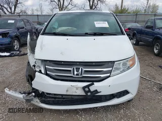2012 Honda Odyssey EX-L with VIN 5FNRL5H67CB082903, listed as a IAAI auction lot 42015904 with 208,300 mi miles and . Bid and sale history available at carsss.com. Image 12.