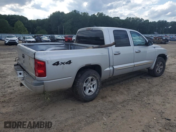 2005 Dodge Dakota SLT z VIN 1D7HW48K85S226691, wystawiony jako Copart lot #59007185 z przebiegiem Nie podano mil oraz Czysty tytuł • Clean title. Historia ofert i sprzedaży dostępna na DreamBid. Obrazek 3.