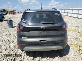 2018 Ford Escape SE z VIN 1FMCU9GD0JUA95941, wystawiony jako Copart lot #56606625 z przebiegiem 137 924 mil mil oraz Nie do naprawy • Non repairable. Historia ofert i sprzedaży dostępna na DreamBid. Obrazek 6.