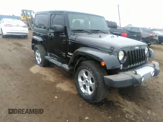 2014 Jeep Wrangler Sahara with VIN 1C4AJWBG9EL161712, listed as a IAAI auction lot 41839193 with 68,318 mi miles and . Bid and sale history available at DreamBid. Image 1.