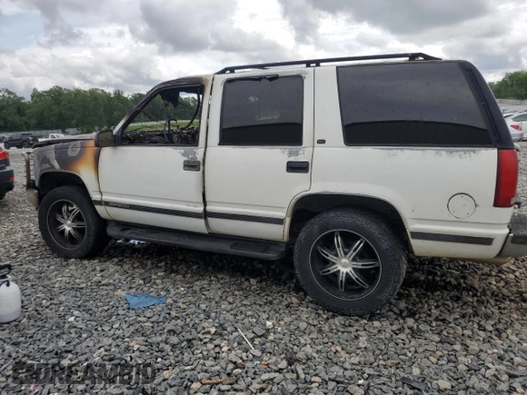1999 GMC Yukon with VIN 1GKEK13R8XJ723636, listed as a Copart auction lot 64458594 with 0 mi miles and Non Repairable. Bid and sale history available at carsss.com. Image 2.