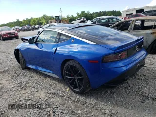2023 Nissan Z Performance z VIN JN1BZ4BH4PM311459, wystawiony jako Copart lot #52156984 z przebiegiem 12 312 mil mil oraz Szkoda całkowita • Salvage title. Historia ofert i sprzedaży dostępna na DreamBid. Obrazek 2.