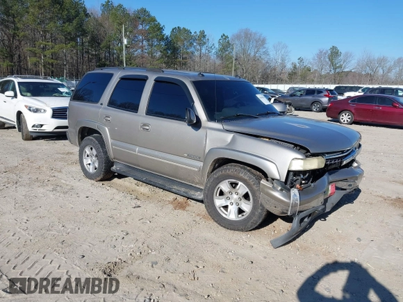 2003 Chevrolet Tahoe LS with VIN 1GNEK13Z03J294201, listed as a IAAI auction lot 41656836 with 302,922 mi miles. Bid and sale history available at carsss.com. Image 1.