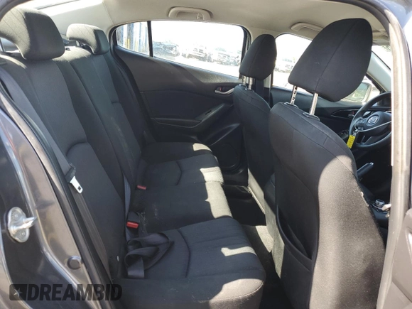 2015 Mazda 3 i Sport z VIN 3MZBM1U70FM215164, wystawiony jako Copart lot #57527785 z przebiegiem 144 621 mil mil oraz Szkoda całkowita • Salvage title. Historia ofert i sprzedaży dostępna na DreamBid. Obrazek 10.
