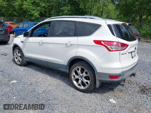 2013 Ford Escape Titanium z VIN 1FMCU9J9XDUA10838, wystawiony jako IAAI lot #42702521 z przebiegiem 86 815 mil mil oraz . Historia ofert i sprzedaży dostępna na DreamBid. Obrazek 3.