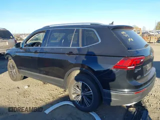 2018 Volkswagen Tiguan SEL with VIN 3VV3B7AX7JM117053, listed as a IAAI auction lot 40827695 with 71,489 mi miles and . Bid and sale history available at DreamBid. Image 14.