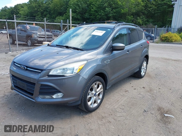 2013 Ford Escape SE with VIN 1FMCU9GXXDUA97162, listed as a IAAI auction lot 42633382 with 74,375 mi miles and . Bid and sale history available at DreamBid. Image 2.